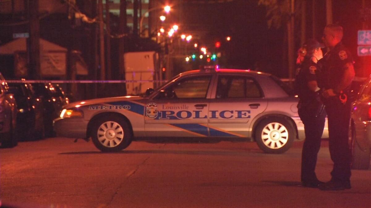 Louisville Metro Police respond to a crime scene